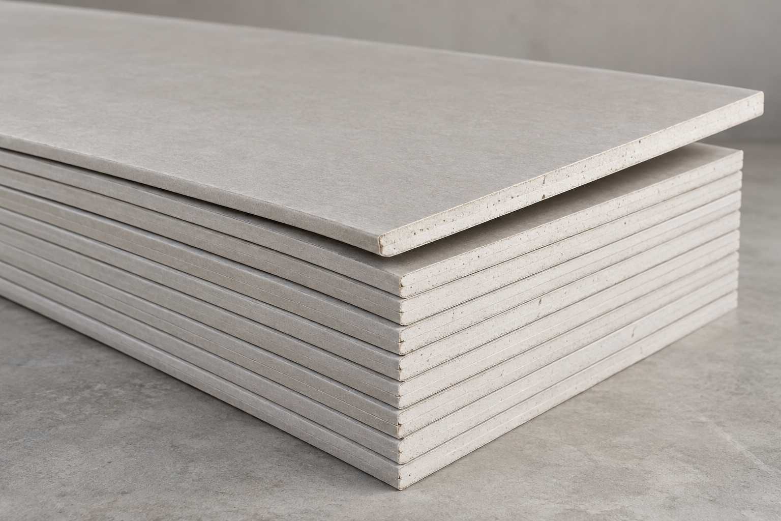 Realistic rendering of stacked gypsum drywall sheets showing paper faces and white cores